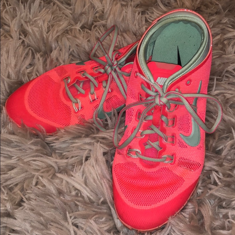 NIKE neon pink and blue training and gym shoes